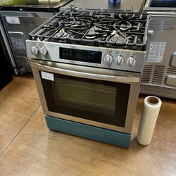 30 inch wide stainless steel slide in gas stove Frigidaire
