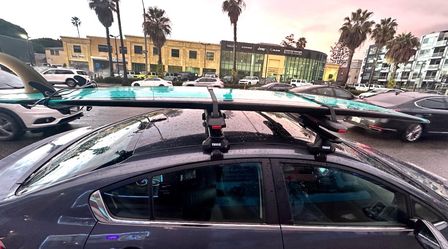 Surfboard roof racks
