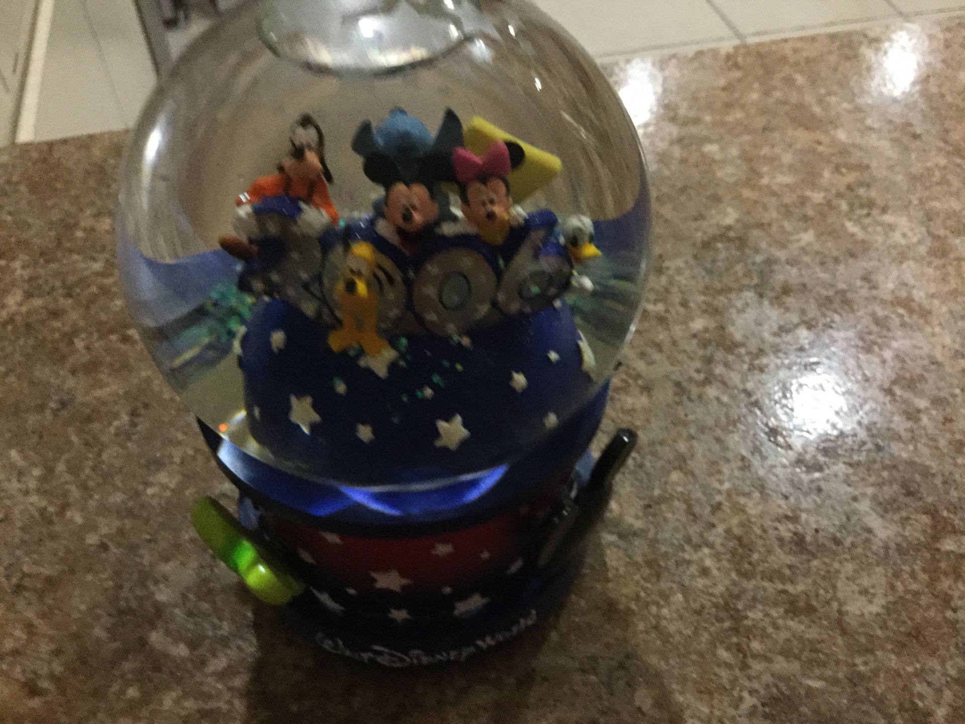 Retired disney parks snow globe. 2006 collectible. Musical. Perfect. Never used displayed only.