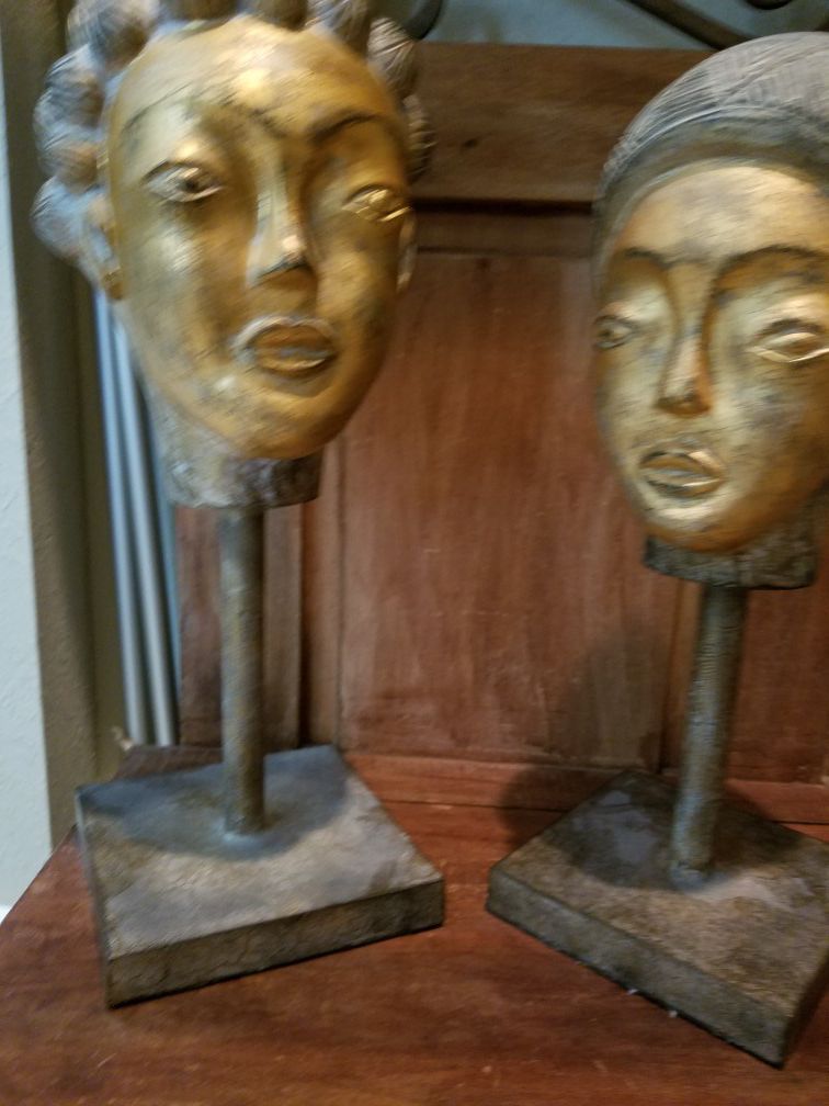 Gold/brass colored statues