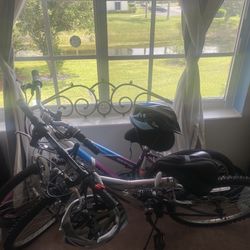 2 Bikes And 2 Helmets 