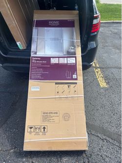 Frameless shower door. Delaney 46 1/4 in. - 48 in. W x 74 in. H Pivot Frameless Shower Door in Brush