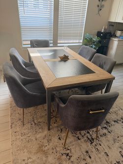 Dinner table with chairs