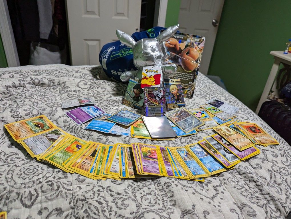 Pokemon Cards With Plushy And Sleeves