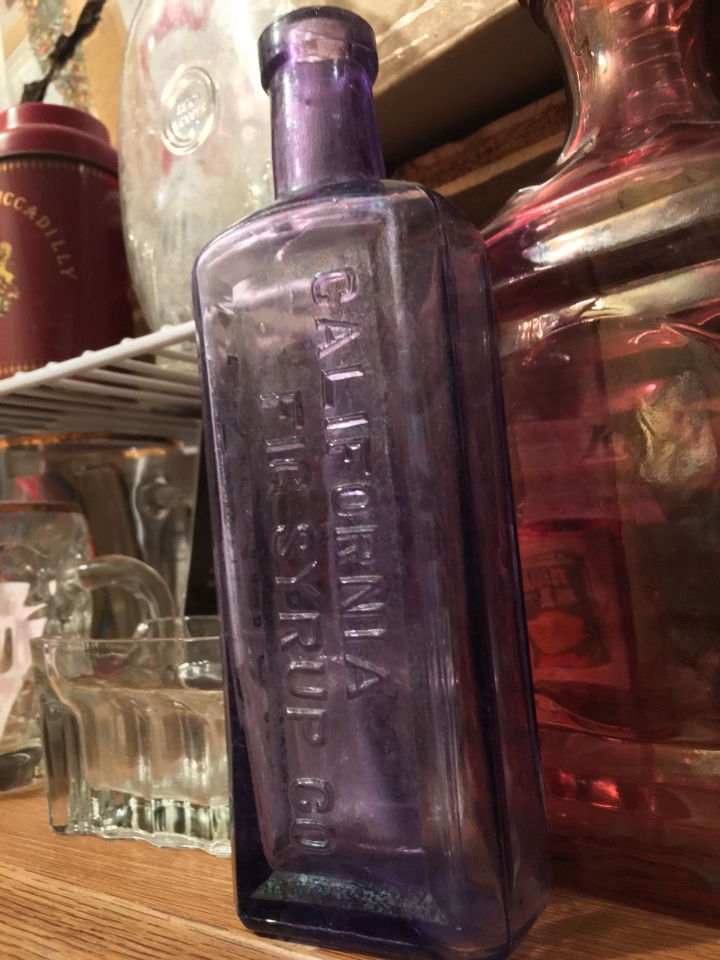 Antique purple glass bottle