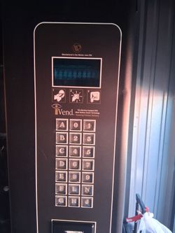 Written/ USI 3184 snack vending machine fully functional