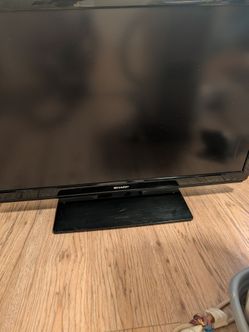 An older 42 in. Sharp TV