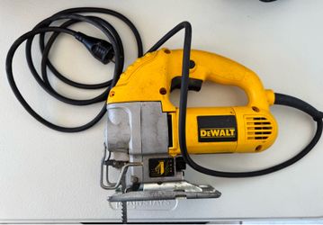 DeWalt DW317K corded jigsaw, featuring a 5.5-amp motor and variable speed control.