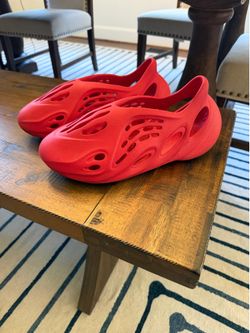 Red Adidas Yeezy foam runners