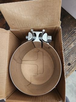 For sale, 5 new in the box ,4 inch exhaust band clamps.