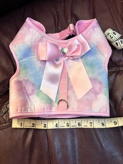Dog pastel colors with bow harness. Wide neck. Medium