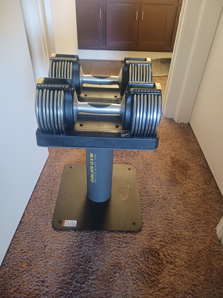 2 Adjustable Dumbells 10 - 50 Lbs