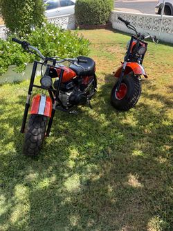 Matched pair of Baja Warrior minibikes.