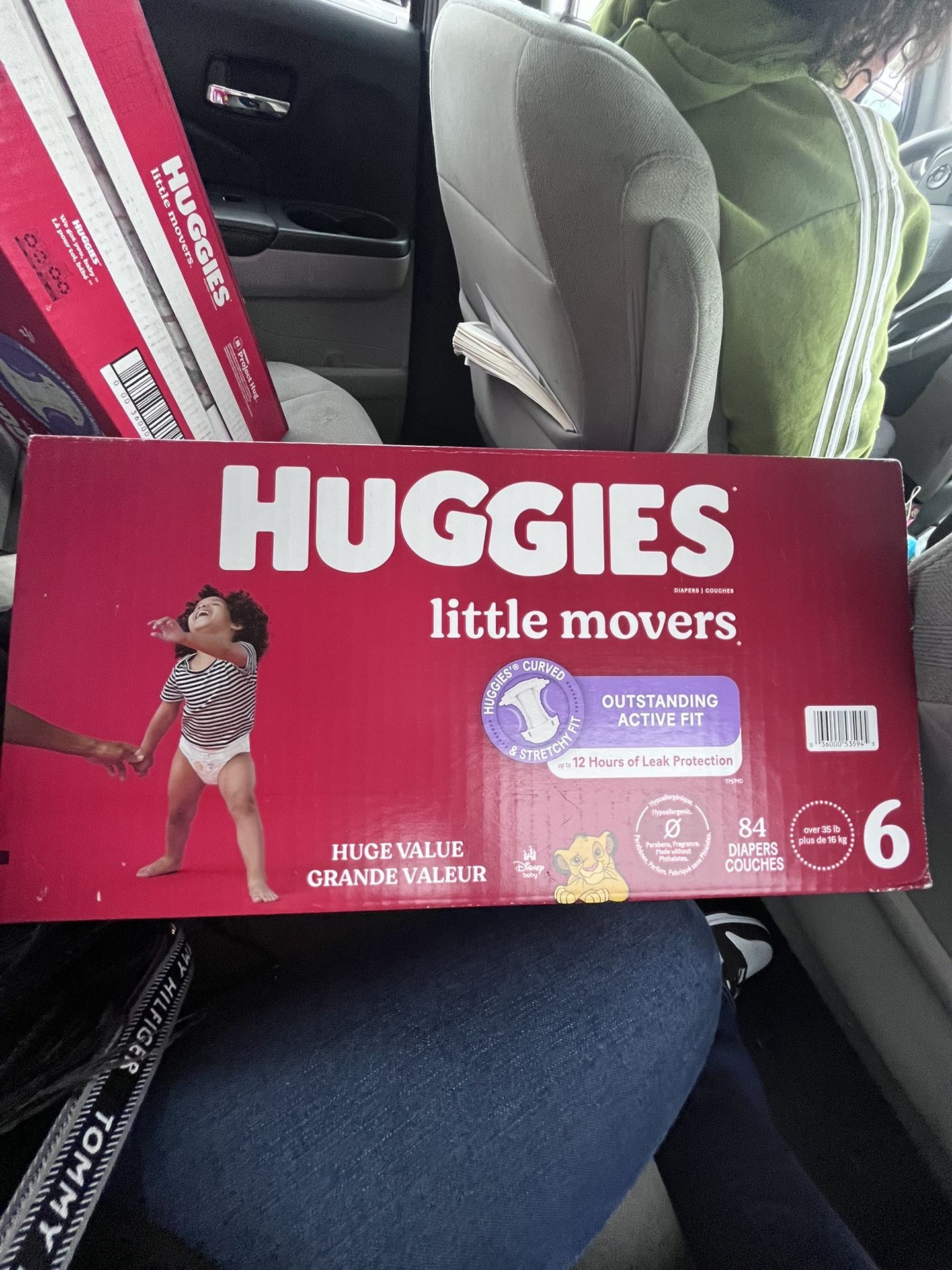 2 boxes of huggies diapers 