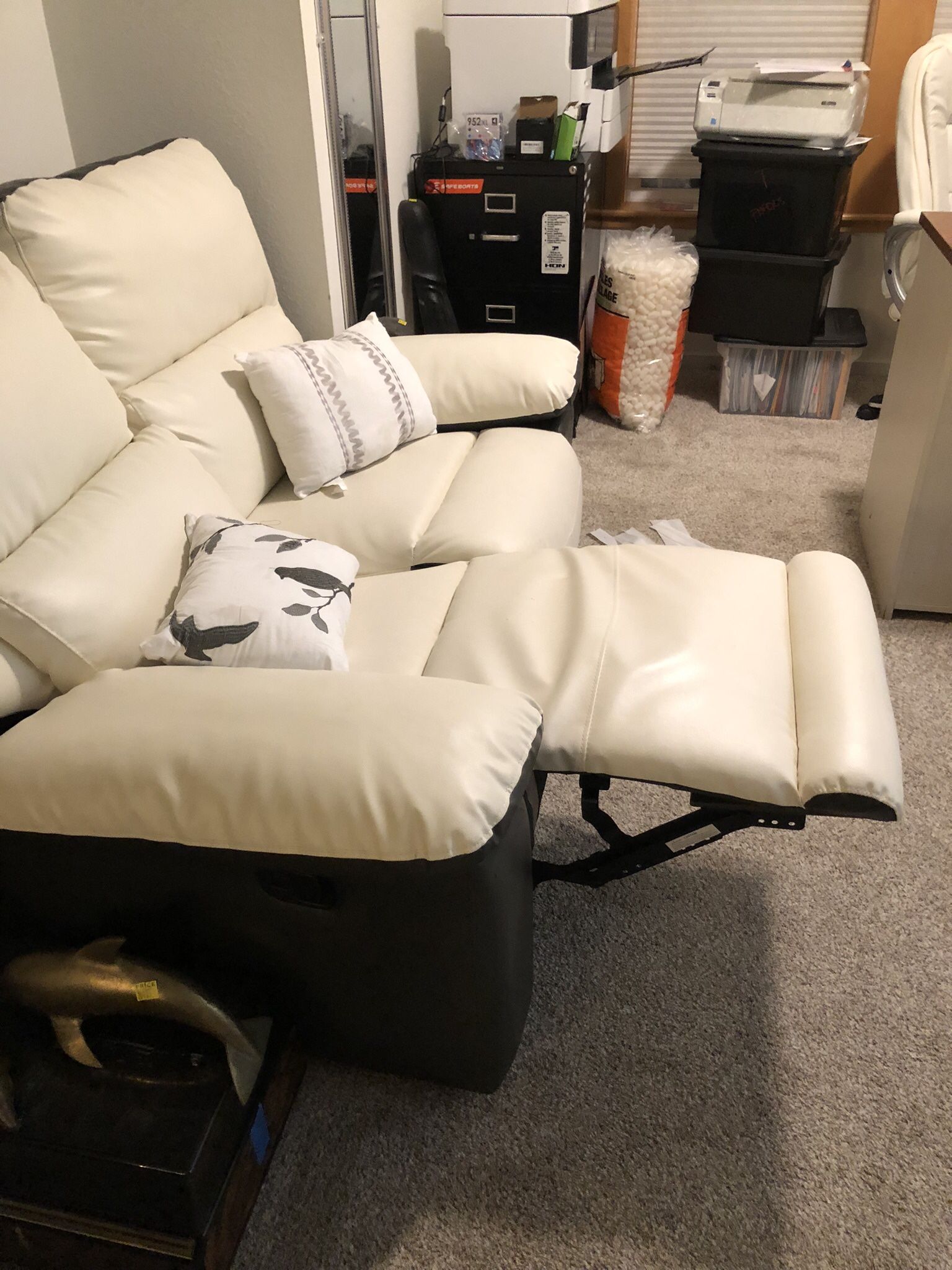 Cream Leather Reclining Loveseat