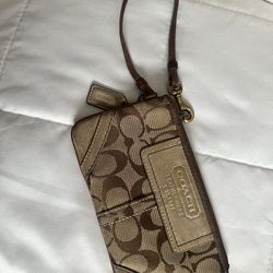 Cartera COACH café