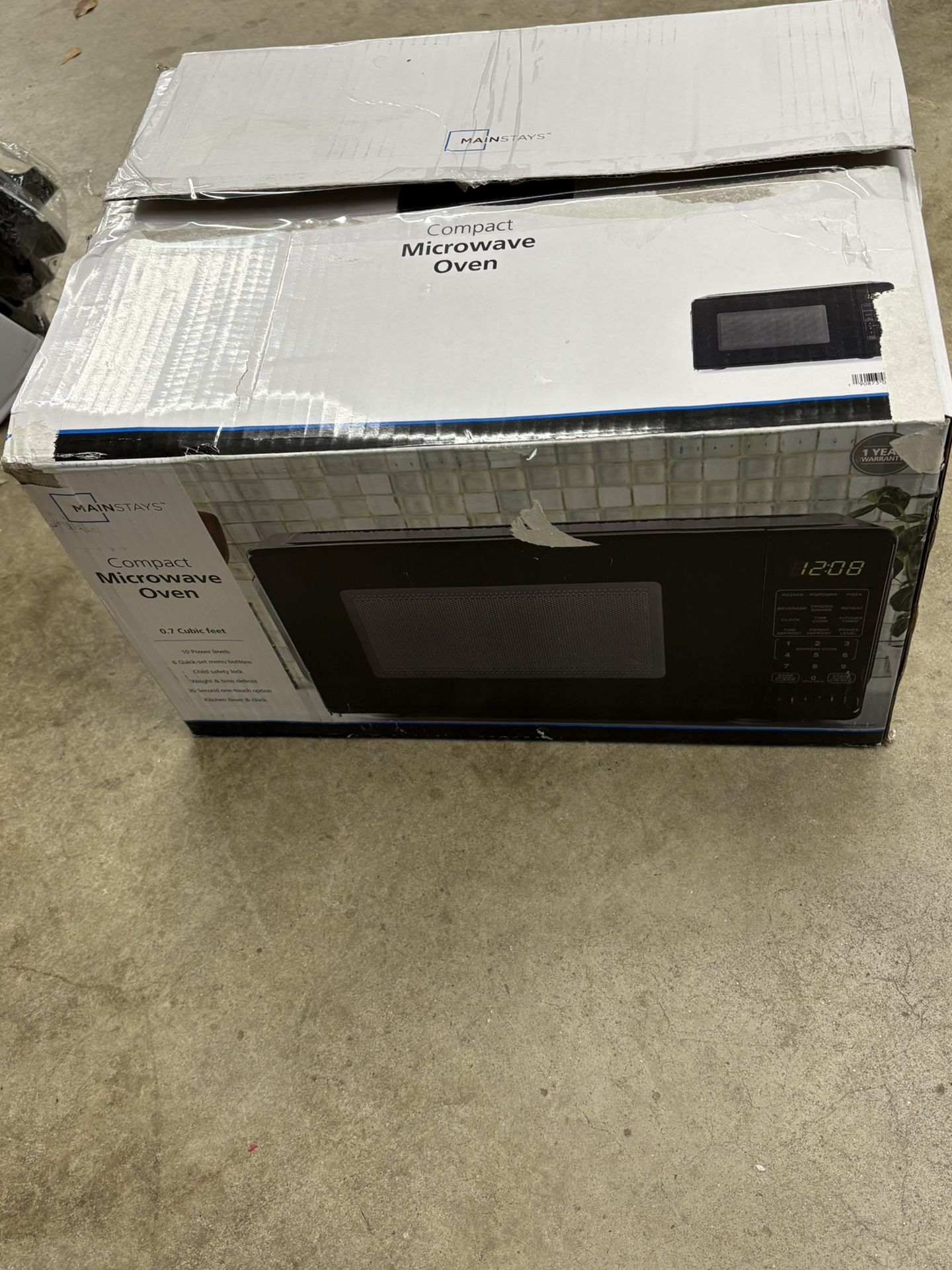 Mainstays .7 Cu Ft Countertop Microwave Oven