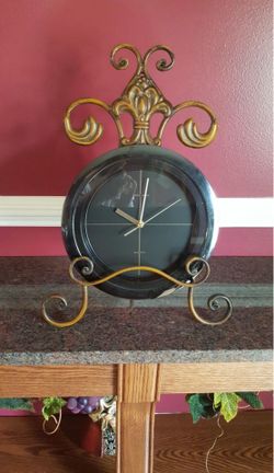 Heirloom quartz clock with stand