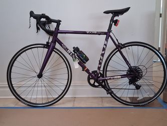That is a Cinelli Vigorelli Road bike in a metallic purple finish