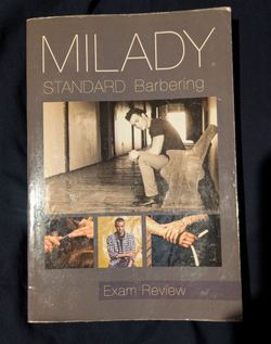 Milady standard barbering book