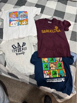 Large bags of clothes for  7-8 year olds