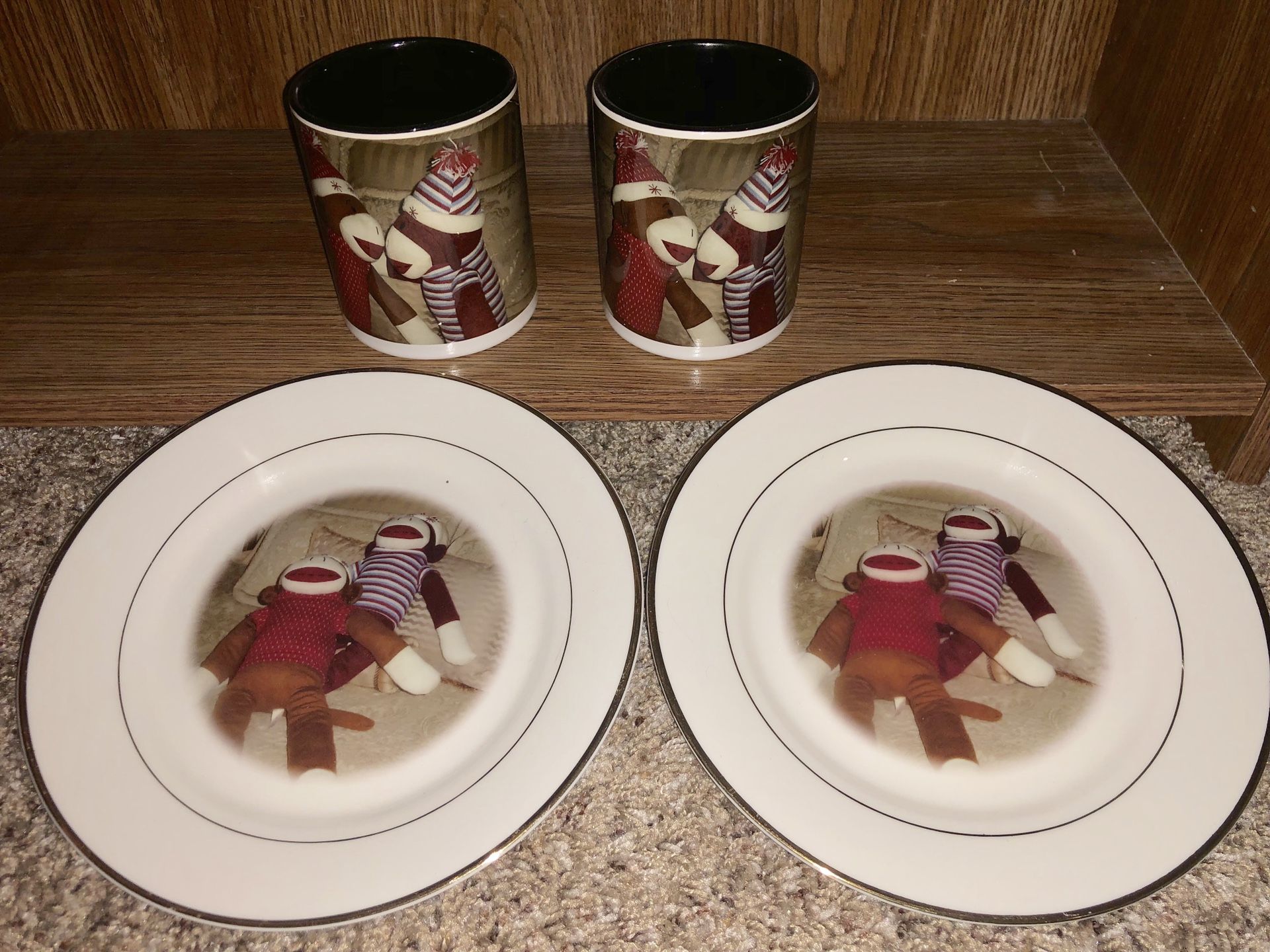 Beautiful sock monkey coffee mugs and matching plates with gold color trim! Lot set!