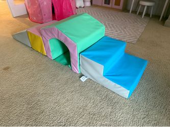 Play place for the kiddo and bag of toys
