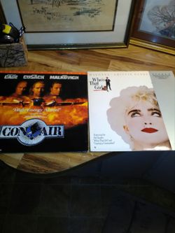 2 widescreen laser discs. Madonnas who's that girl and Conair