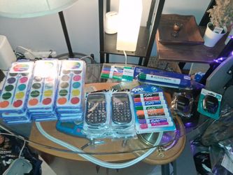 Watercolor paints dry , erase markers , sharpener and calculators