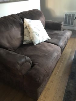 Brown love seat