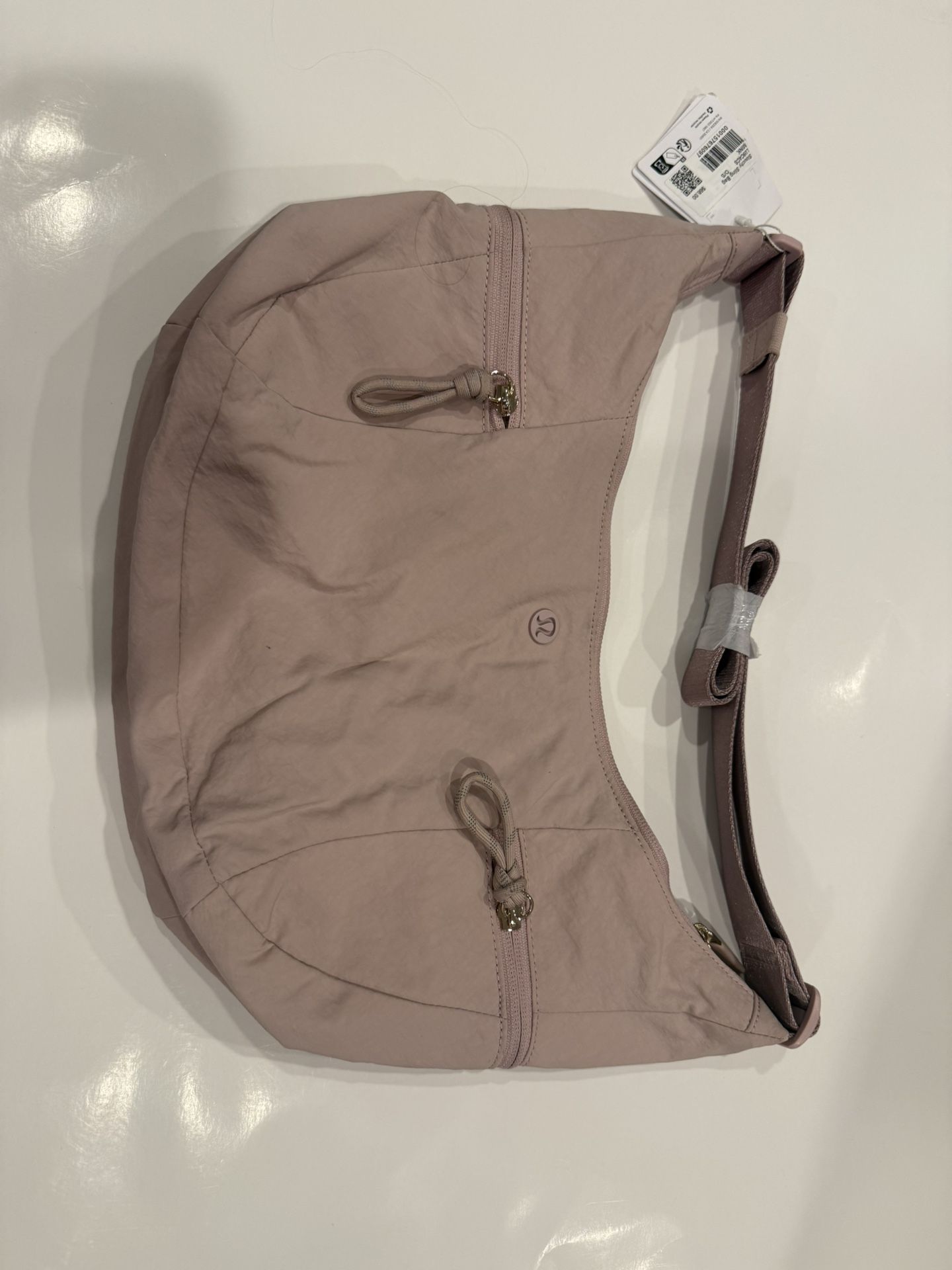 Lululemon slouchy sling bag pink 