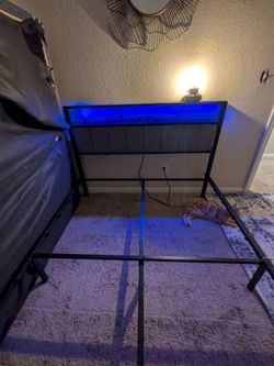 Full Size bed frame with charging port and blue lights!