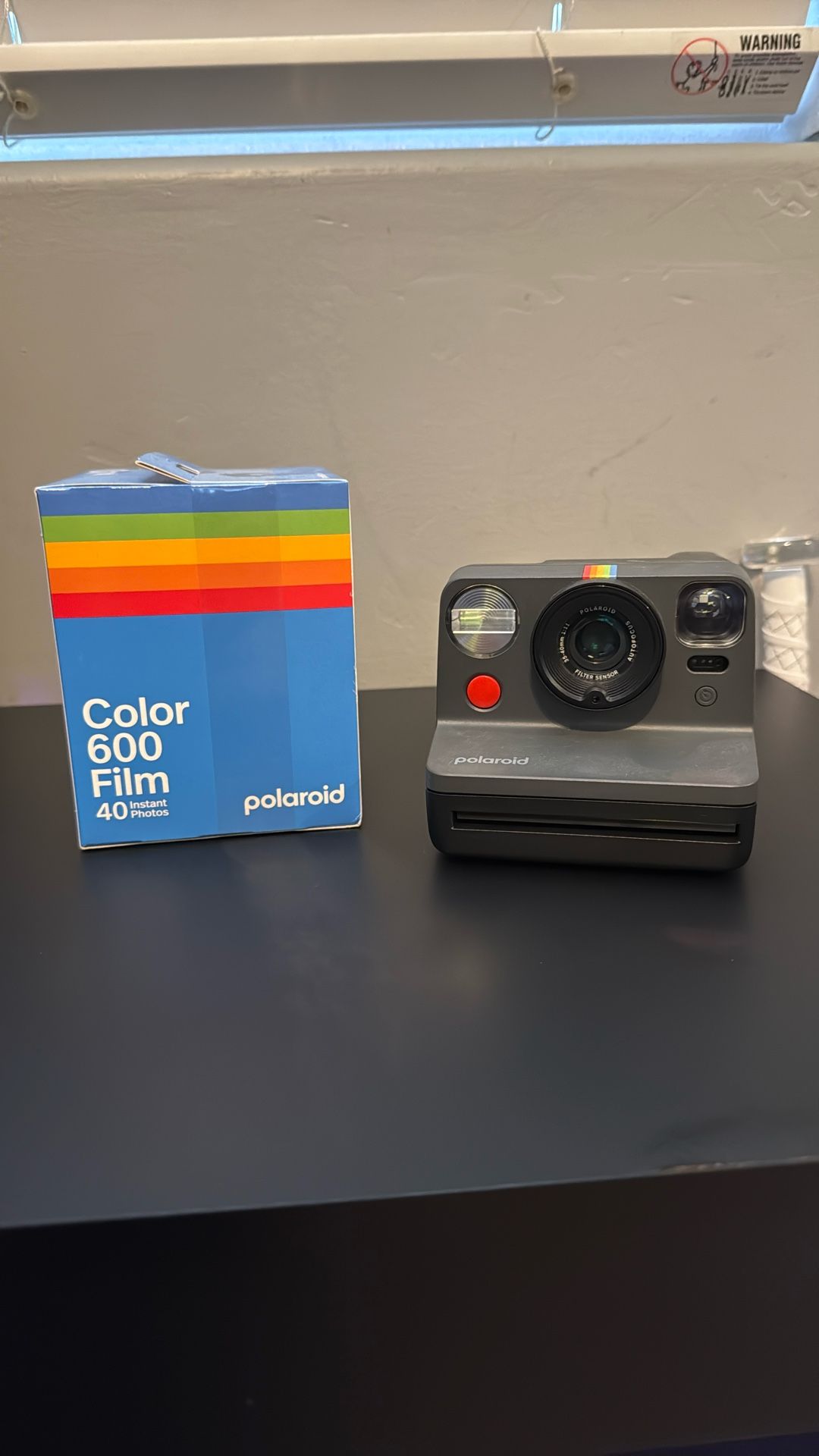Polaroid now camera with film