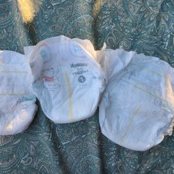 Size Nb, 1, and 2 Diapers 