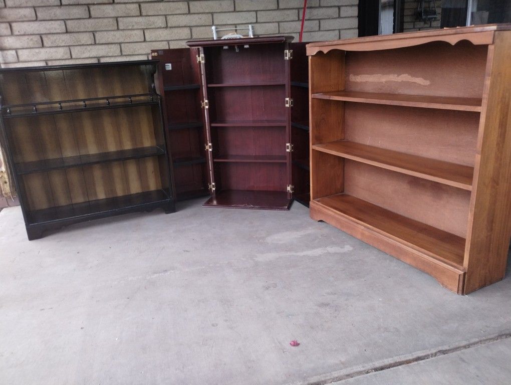 Bookshelves And One Liquor Cabinet.