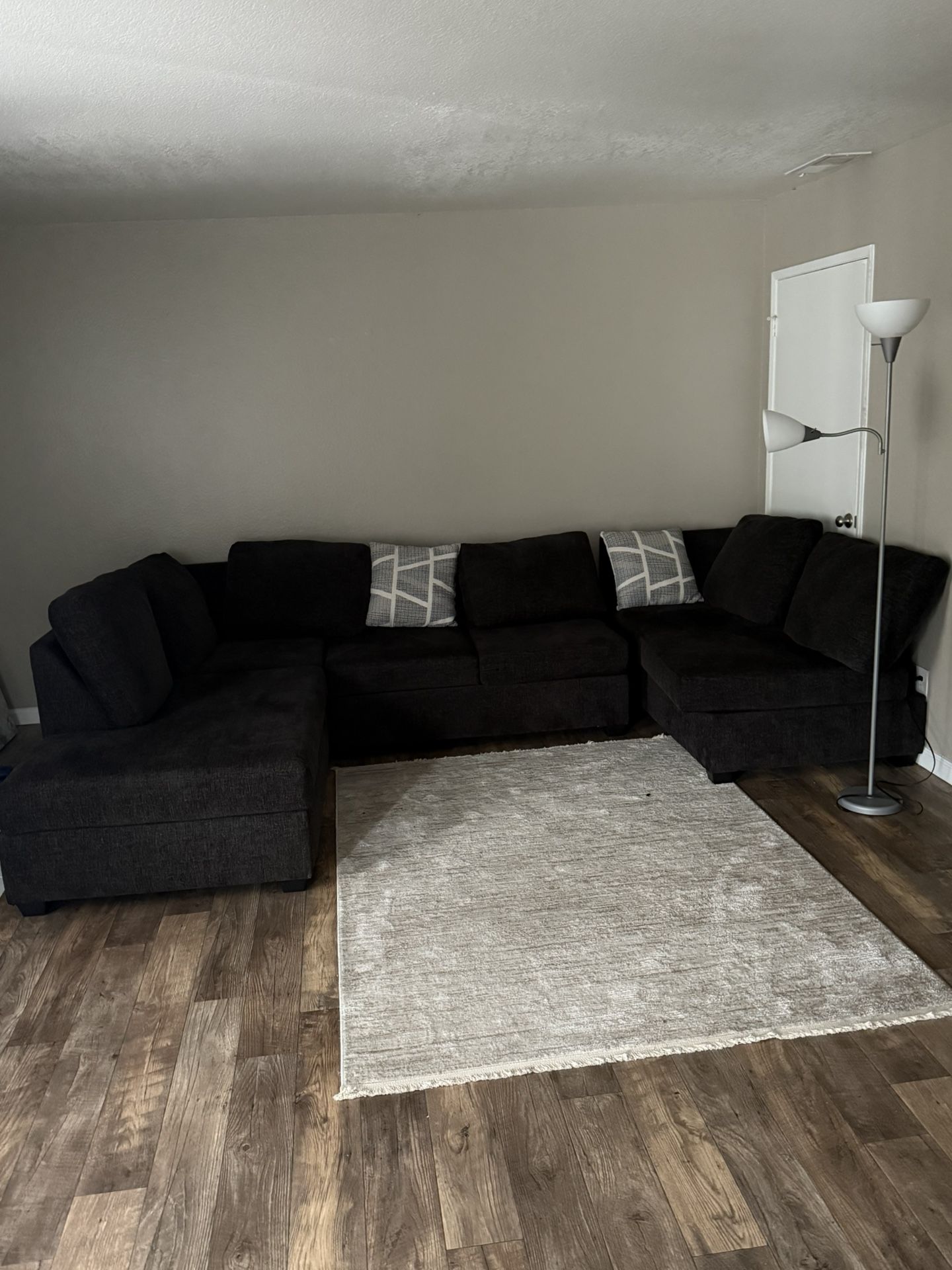 Large sized wraparound sofa