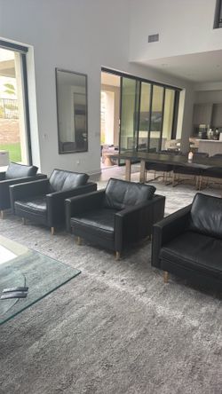 4 Black leather living room chairs