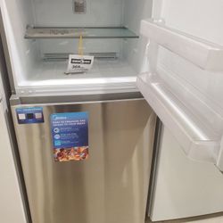 Frigidaire FFTR1814LB 18.2 Cu. Ft. Black Top Freezer Refrigerator