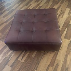 Brown leather ottoman