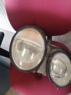 Headlights and steering wheel for a 2000 Mercedes clk
