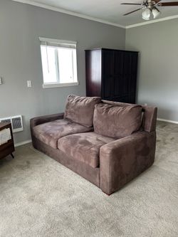 FREE Pull out Mattress Loveseaf
