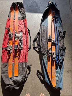 Vintage 1975s Olin Mark I snow skis with Look bindings and original sky rackets