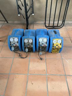 Refrigerant recovery machines