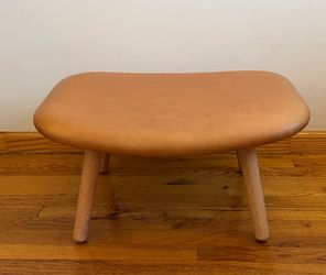 Brown leather lounge ottoman