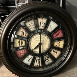 vintage clock and a wall decoration 