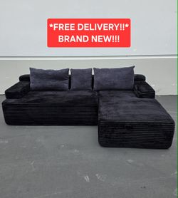 NEW BONELESS BLACK COUCH