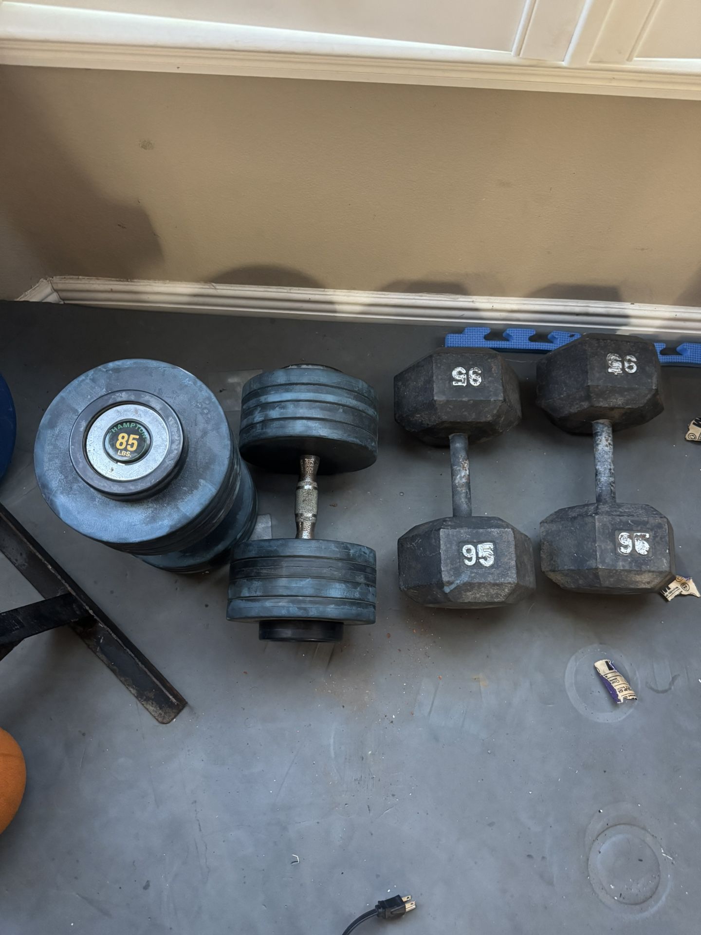 Pairs of 95,85 dumbbells weights 370lbs total prices are in description
