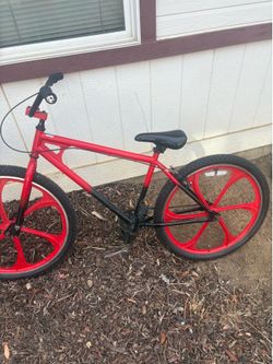 red 26 inch mongoose with odi grips