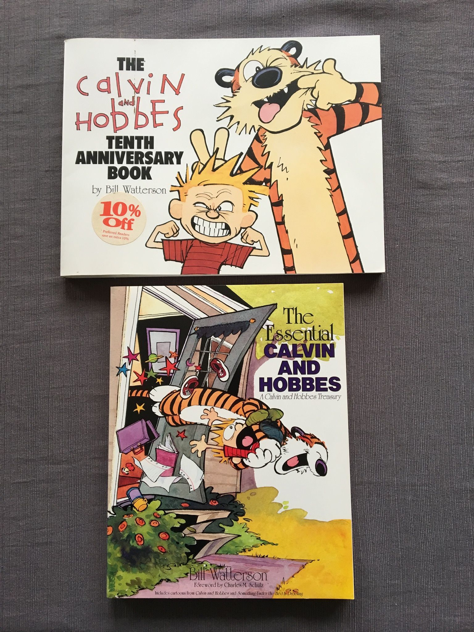 Calvin and Hobbes collectible set of 2 comic books, The Essential Calvin and Hobbes, 255 pages, The Calvin and Hobbes Tenth Anniversary Book 208 pages