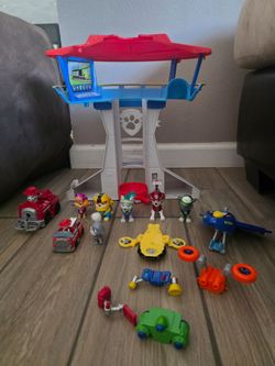 Paw patrol tower and 6 figurines, vehicles and weapons